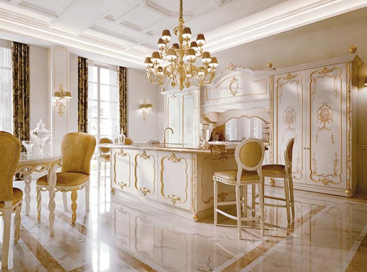 کابینت لاکچری سفید کلاسیک با طرح‌ها و منبت کاری‌های طلایی به همراه تاج و سرستون