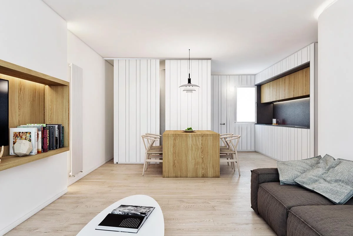 اتاق‌نشیمن کوچک با دکوراسیون سفید و چوبی و کف‌پوش چوبی قهوه‌ای روشن